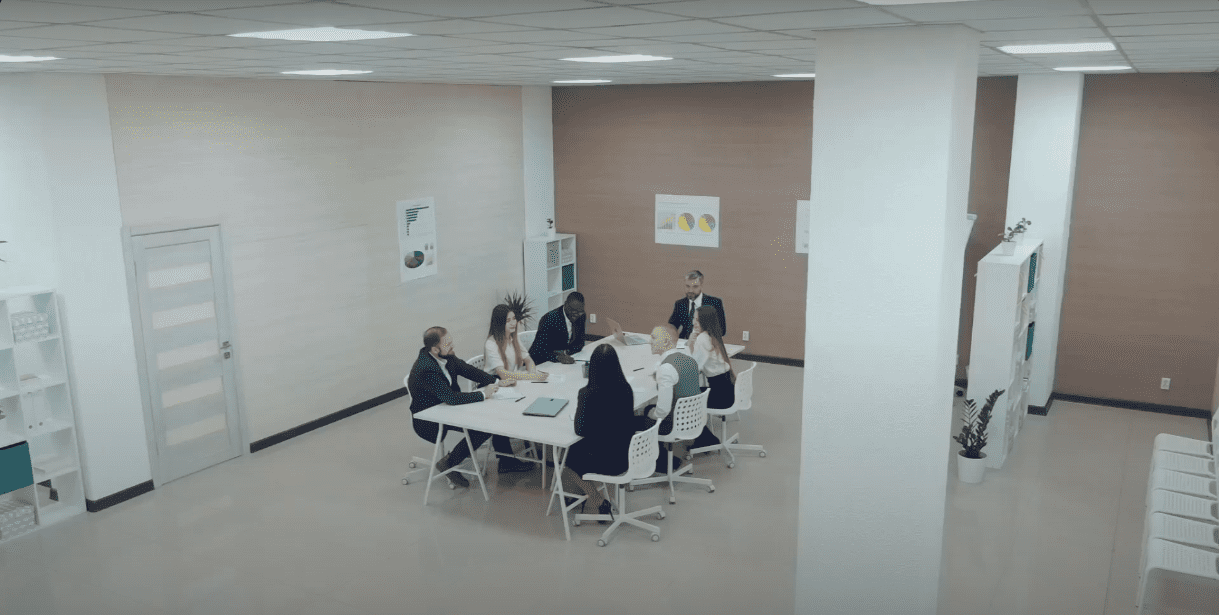 covbus Business meeting around a conference table.